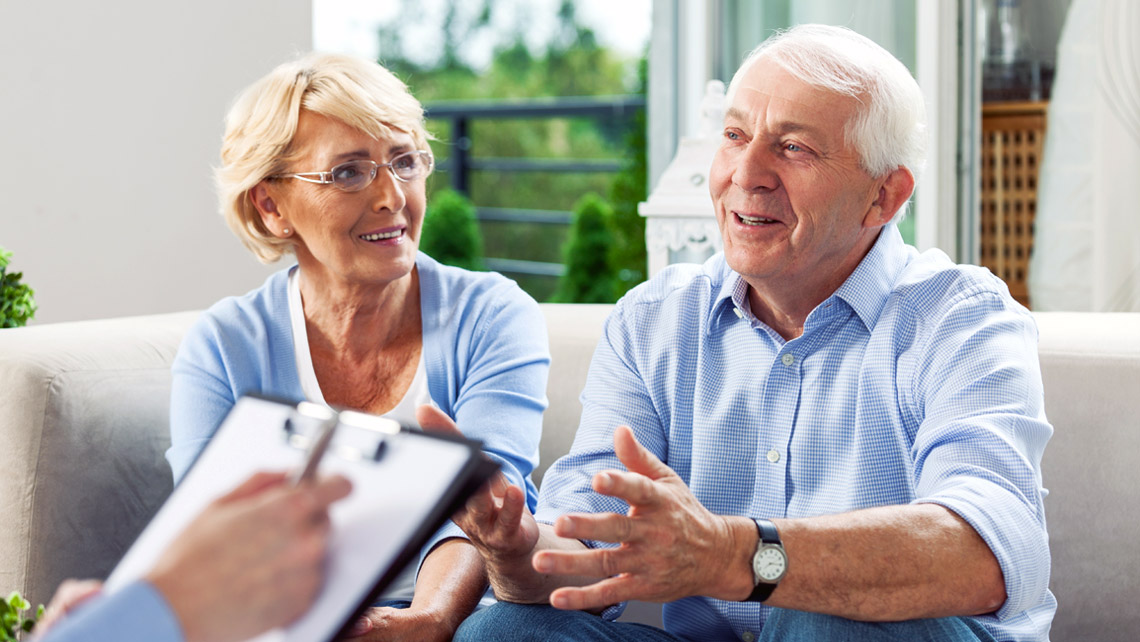 Senior couple discussing Medicare plans